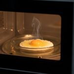 Egg frying in a microwave-safe plate quick egg recipe